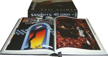 A copy of Absolute Sandman opened to the middle of the book with another copy of the book closed behind it so the spine is visible