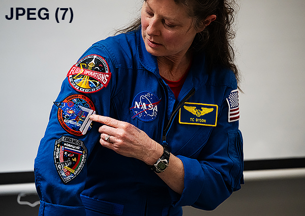 A high quality image of NASA Astronaut Tracy Dyson pointing to the Expedition 71 patch on her flight suit on Wednesday, March 5, 2025 at Elsie Whitlow Stokes Community Freedom Public Charter School in Washington, D.C. (Image credit: NASA/Joel Kowsky)